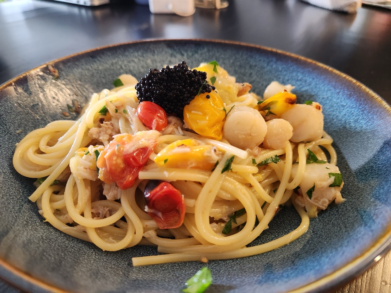 Crab and scallop spaghetti in a white wine sauce